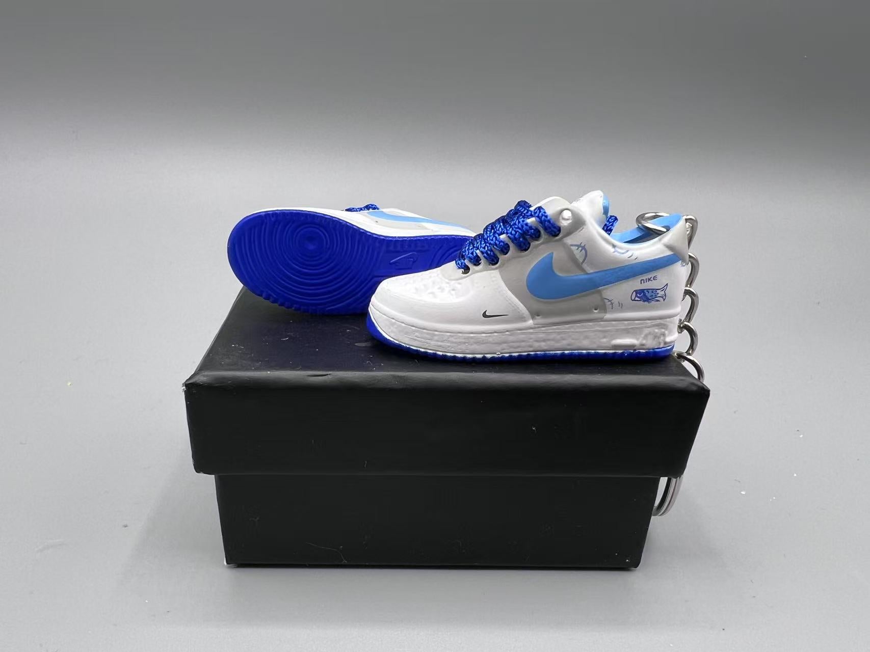1:6 Scale Mini Sneaker – Doll Wear or Keychain – "Blue Swoosh Cartoon White"