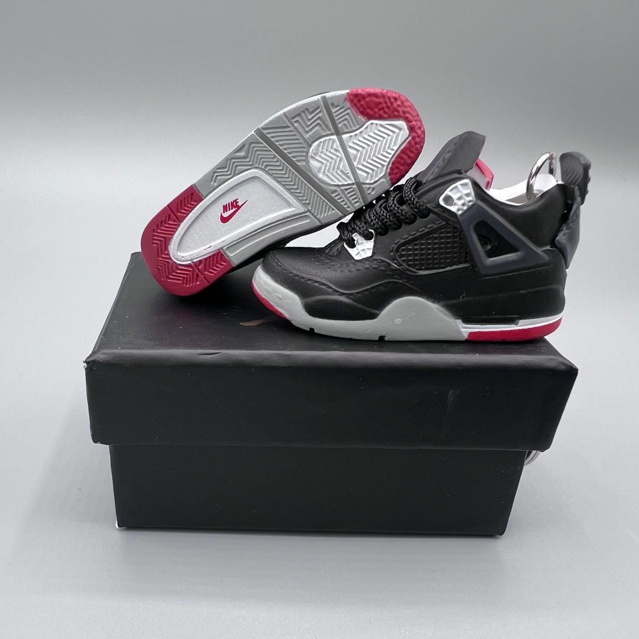 Artist Edition: AJ4 Bred Toe Sneaker Bricks