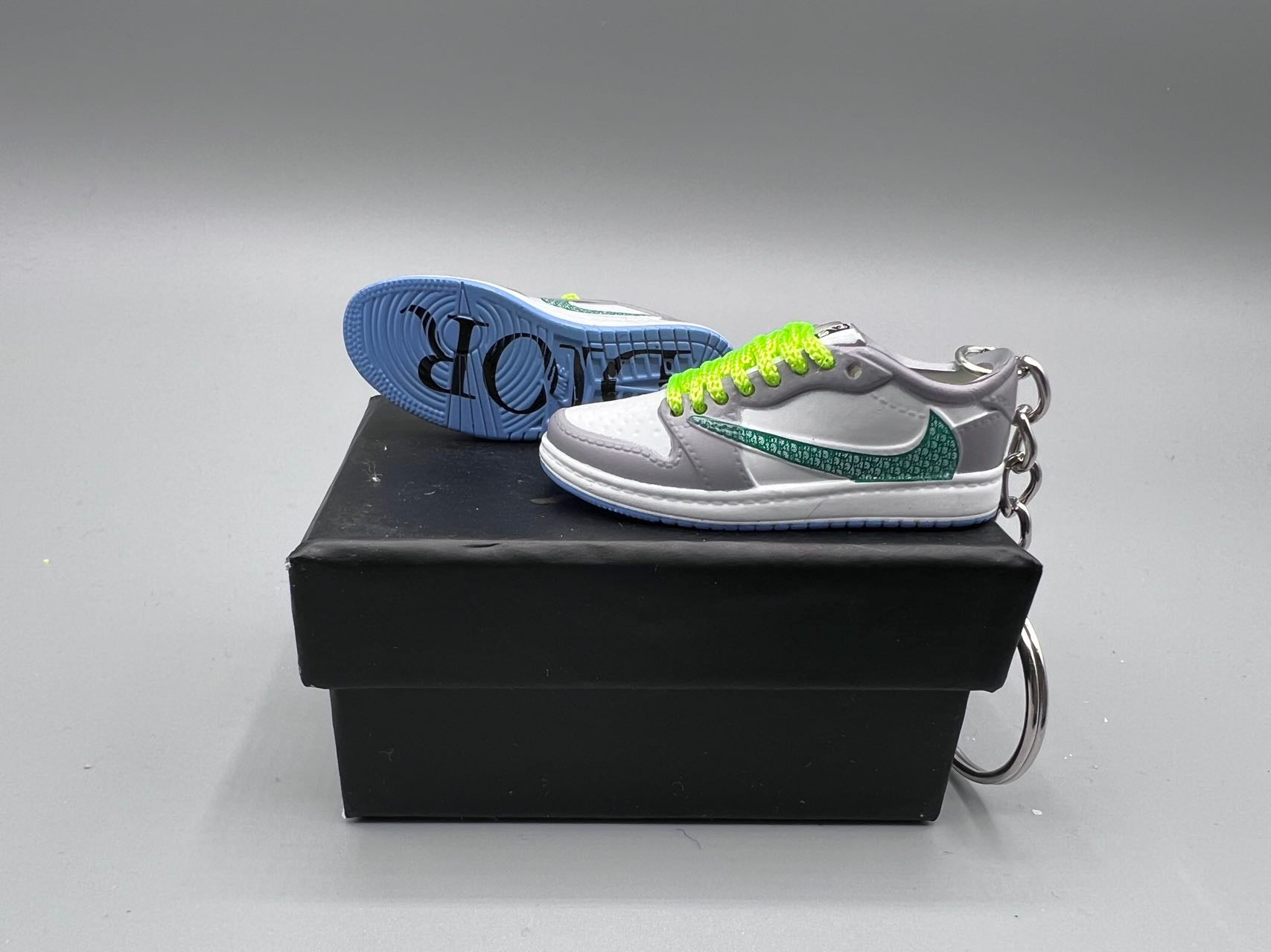 Artist Edition: AJ1 Low Designer Grey Sneaker Bricks